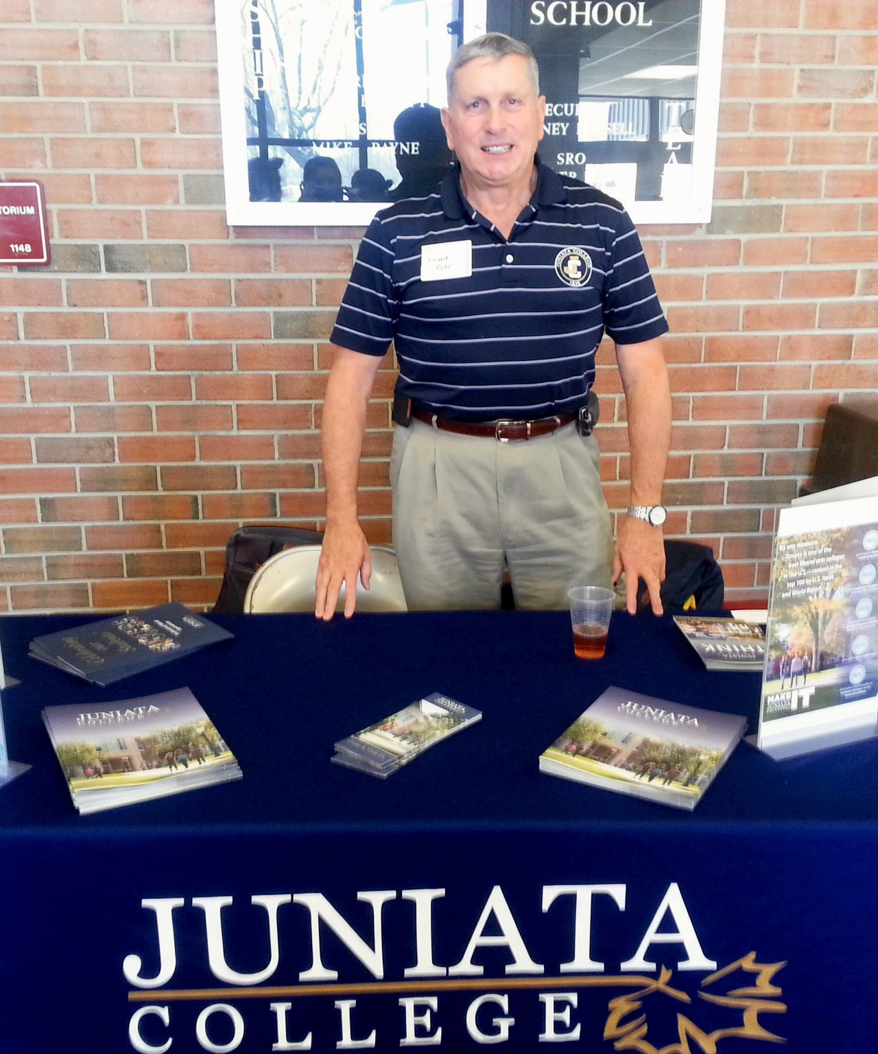 Frank Pote representing Juniata College at a College Fair
