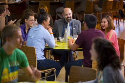 dean in baker with students